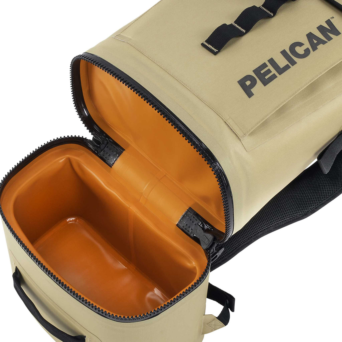 Pelican™ Dayventure Backpack Soft Cooler in tan with cooler compartment opened